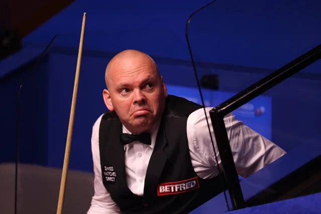 Stuart Bingham of England reacts during the Betfred World Snooker Championship Round One match between Ding Junhui of China and Stuart Bingham of England at Crucible Theatre on April 19, 2021 in Sheffield, England. A maximum of 33% of the venue capacity is allowed to open for spectators as part of a Government pilot event. (Photo by George Wood/Getty Images)