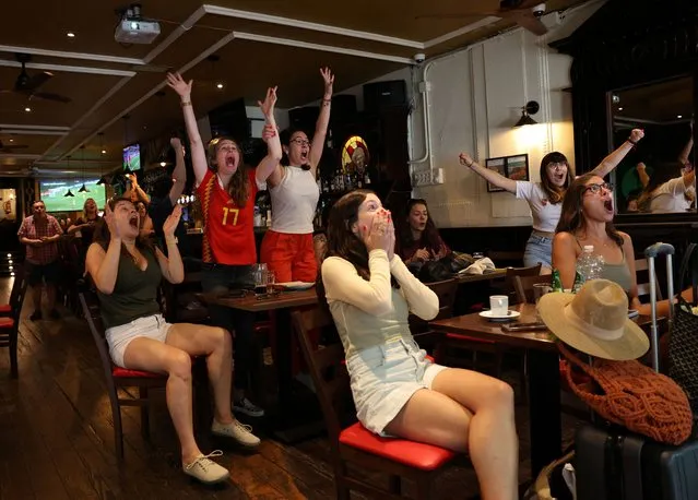 Spain fans celebrate in a bar in Madrid after Spain's Olga Carmona scores their second goal in the semi final match between Spain v Sweden during the FIFA Women's World Cup Australia and New Zealand on August 15, 2023. (Photo by Violeta Santos/Reuters)