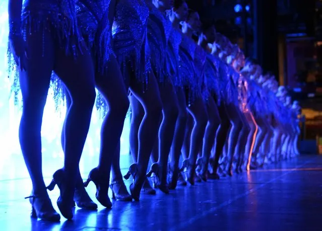 A view from backstage as the Rockettes line up during a song during the 2015 Radio City Christmas Spectacular at Radio City Music Hall in New York City on December 2, 2015. (Photo by Timothy A. Clary/Getty Images)