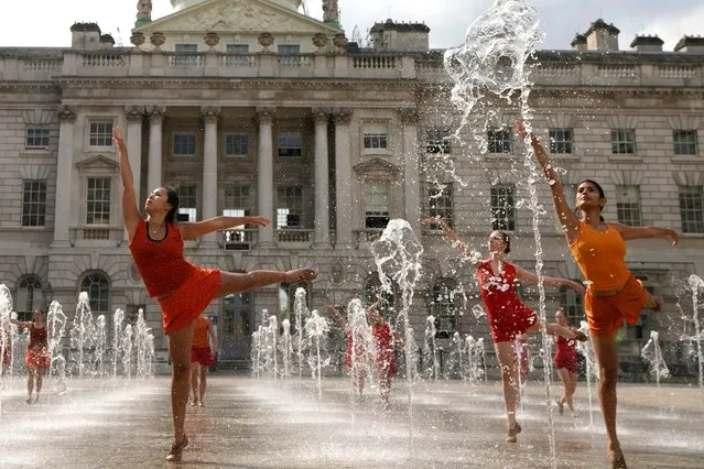 Dancers from Shobana Jeyasingh Dance rehearse Counterpoint in the fountains at Somerset House ahead of this weekend's performances as part of Westminster City Council's Inside Out Festival, in London, Thursday, August 17, 2023. (Photo by Kirsty Wigglesworth/AP Photo)