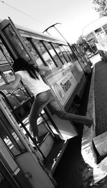 “Taking a tram in Rome, 2011”. (Photo by Martino Giuseppe)