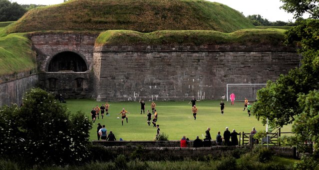The Berwick Charities Cup celebrates it's centenary this year. Matches are played at The Stanks, a pitch at the foot of the Elizabethan walls of Berwick-upon-Tweed. Berwick Rangers XI play the Flying Dutchmen in their Group F fixture, Britain, June 30, 2022. (Photo by Carl Recine/Action Images via Reuters)