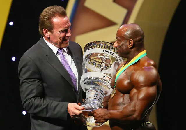 Arnold Schwarzenegger poses with winner Dexter Jackson of the USA after winning the Arnold Classic Australia at The Melbourne Convention and Exhibition Centre on March 14, 2015 in Melbourne, Australia. (Photo by Robert Cianflone/Getty Images)