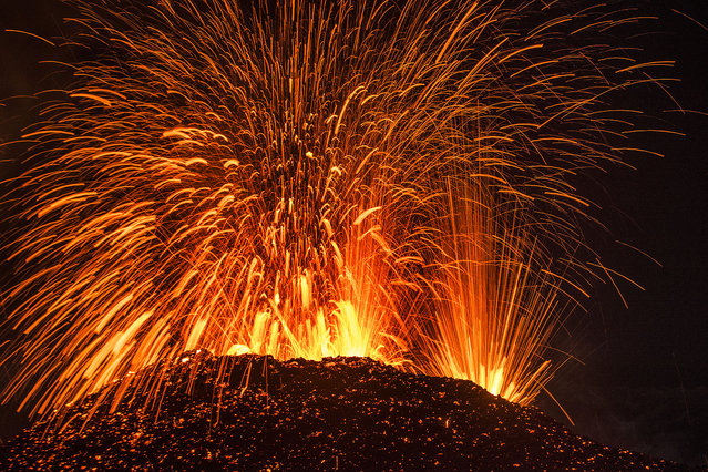 The powerful erupting volcano. (Photo by Luc Perrot/Caters News)