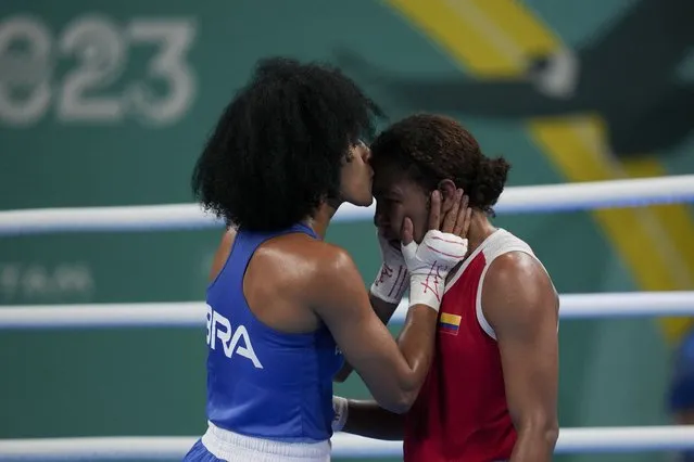 Brazil's Barbara Dos Santos, left, kisses Colombia's Camila Camilo at the end of a women's 66kg semifinal boxing bout at the Pan American Games in Santiago, Chile, Thursday, October 26, 2023. (Photo by Dolores Ochoa/AP Photo)