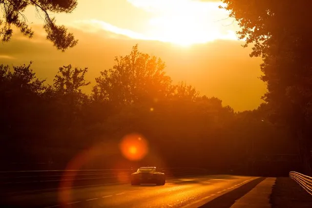Low light action as sun sets at the Le Mans 24 Hour Race on August 21, 2021 in Le Mans, France. (Photo by James Moy Photography/Getty Images)