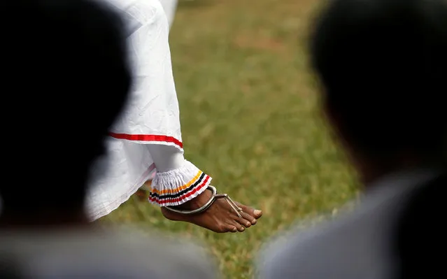 A school boy who attends Sri Lankan traditional dance training performs during their graduation ceremony at a Buddhist temple in Colombo, Sri Lanka January 23, 2017. (Photo by Dinuka Liyanawatte/Reuters)