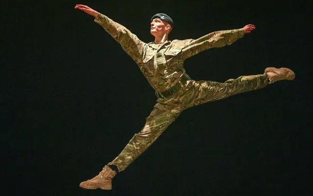 Serving soldier in the British Army, Trooper Alex Smith, 22, of 1st The Queen's Dragoon Guards, leaps into the air during rehearsals for a production called “10 Soldiers” by the Rosie Kay dance company about military life on April 2, 2019. (Photo by Ben Birchall/PA Images via Getty Images)