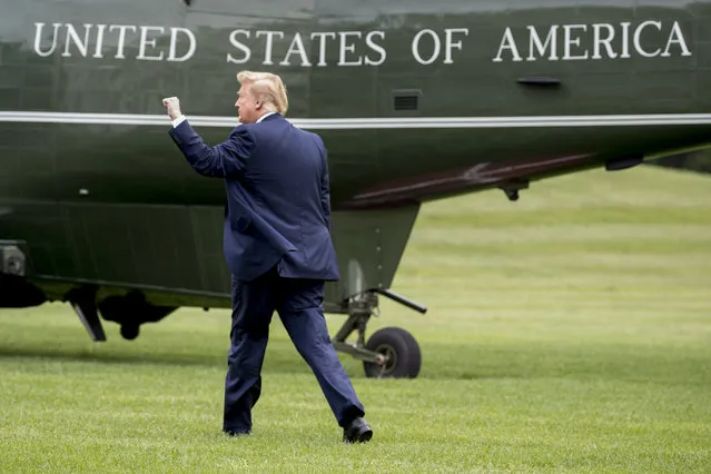 President Donald Trump walks on the South Lawn of the White House in Washington, Wednesday, May 8, 2019, to board Marine One for a short trip to Andrews Air Force Base, Md., to travel to Florida to visit with those affected by Hurricane Michael and attend a rally. (Photo by Andrew Harnik/AP Photo)