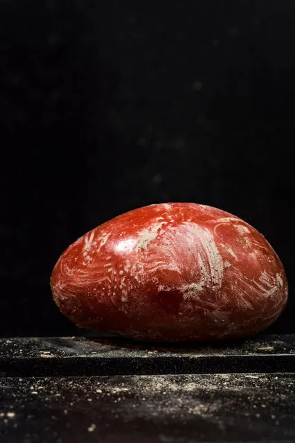 Professional still life category winner. Migrant Tomatoes, by Francesco Amorosino, Italy. Amorosino explains: “Tons of tomatoes are grown in the fields of the south of Italy and harvested by about 19,000 labourers, paid one or two euros for each filled box. In 2015 there were 13 deaths at work in the fields because of high temperatures. Many of those involved in the harvest are immigrants. On the tomatoes, still dirty with soil, I saw the fingerprints of those who had harvested, imagined their stories, the hours spent in the sun, the hope, the desire to work”. (Photo by Francesco Amorosino)