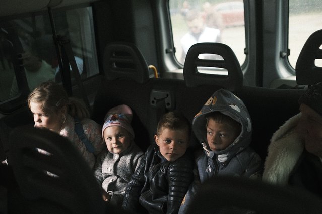 Ukrainian police help civilians evacuate Vovchan district to safe zones due to Russian offensive after Ukraine pulls its troops back in Kharkiv region, Ukraine on May 15, 2024. (Photo by George Ivanchenko/Anadolu via Getty Images)