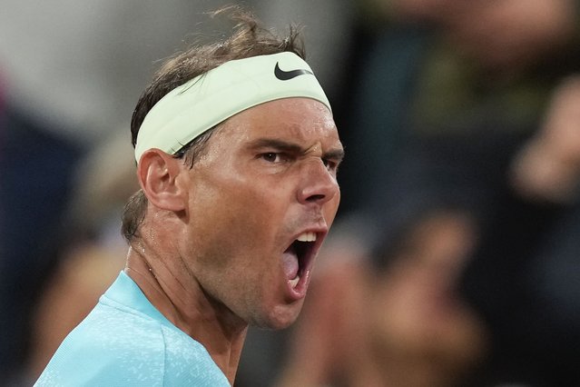 Spain's Rafael Nadal celebrates scoring a point during his first round match of the French Open tennis tournament against Germany's Alexander Zverev at the Roland Garros stadium in Paris, Monday, May 27, 2024. (Photo by Thibault Camus/AP Photo)