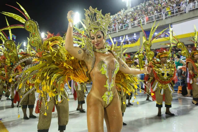 People of the Samba School Academicos de Vigario geral perform during the Rio Carnival, in Rio de Janeiro, Brazil, on February 21, 2020. (Photo by Gilson Borba/NurPhoto)