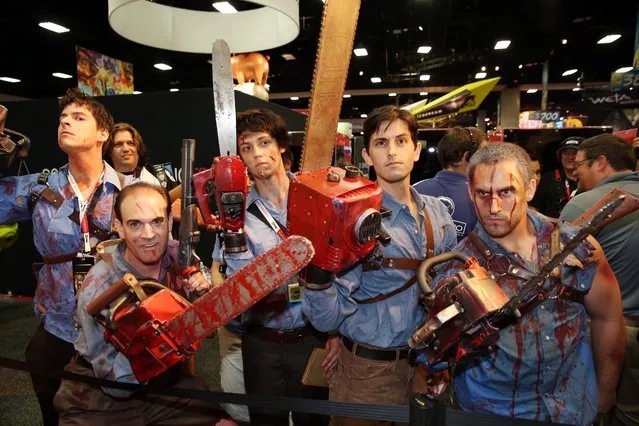 Fans dressed as Ash are seen at an autograph signing for the STARZ original series “Ash vs Evil Dead” at San Diego Comic-Con on Friday, July 10, 2015 in San Diego. (Photo by Matt Sayles/Invision for STARZ/AP Images)