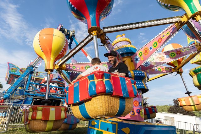 Attendees enjoy a ride on opening day at the Orange County Fair in Middletown, New York, July 18, 2024. (Photo by Allyse Pulliam/The Times Herald-Record via USA TODAY Network)