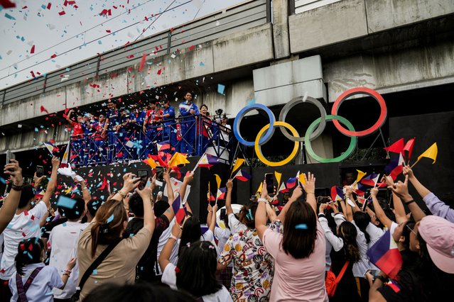 Filipino gymnast Carlos Edriel Yulo, who won gold medals in men's floor exercise and men's vault at the Olympics, joins a welcoming parade for Filipino athletes who competed at the Paris 2024 Olympics, in Manila, Philippines, on August 14, 2024. (Photo by Lisa Marie David/Reuters)