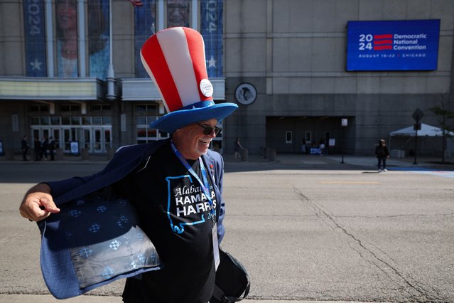 An attendee arrives for Day 2 of the Democratic National Convention (DNC) at the United Center, in Chicago, Illinois, U.S., August 20, 2024. (Photo by Kevin Wurm/Reuters)