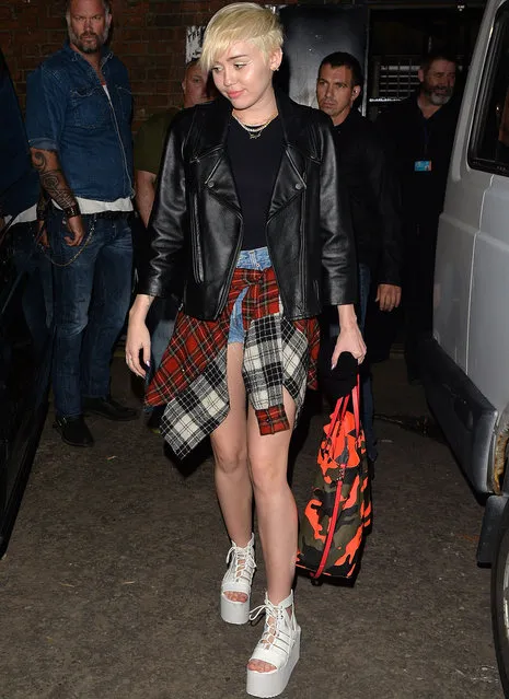 Singer Miley Cyrus leaving the 100 Club after watching her Bangerz tour support act, American Hi-Fi. (Photo by Gotcha Images/Splash News)