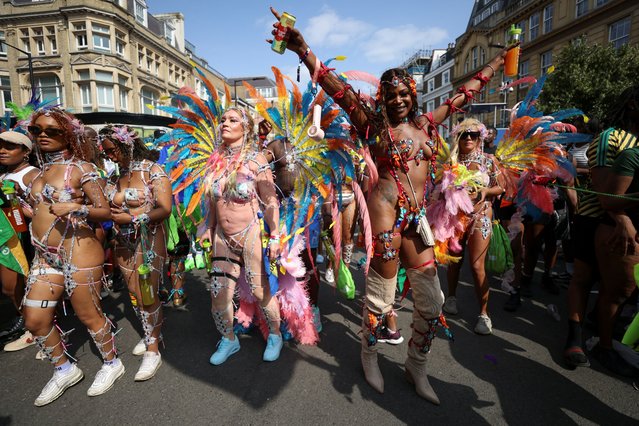 Revellers participate in the Notting Hill Carnival parade, in London, Britain on August 26, 2024. (Photo by Hollie Adams/Reuters)