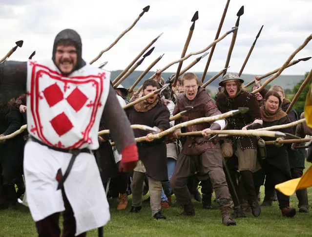 A re-enactor playing the part of Sir Thomas Randolph (L) rehearses for the Battle of Bannockburn Live event on June 27, 2014 in Stirling, Scotland. The 700th anniversary of the historic battle that saw outnumbered Scots army conquer the English led by Edward II in the First War of Scottish Independence. (Photo by Peter Macdiarmid/Getty Images)