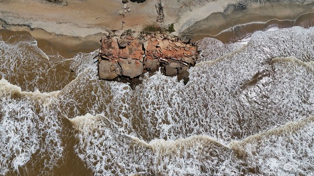 A drone view shows the remains of a destroyed house on the beach in Atafona, Rio de Janeiro state, Brazil, on September 16, 2024. (Photo by Ricardo Moraes/Reuters)