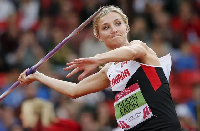 Brianne Theisen-Eaton of Canada competes in the women's Heptathlon Javelin Throw at the 2014 Commonwealth Games in Glasgow, Scotland, in this July 30, 2014 file photo. After just two years of marriage, Ashton Eaton and Brianne Theisen-Eaton are hoping this month to enjoy what most couples wait 50 years for – a very special golden celebration. (Photo by Suzanne Plunkett/Reuters)