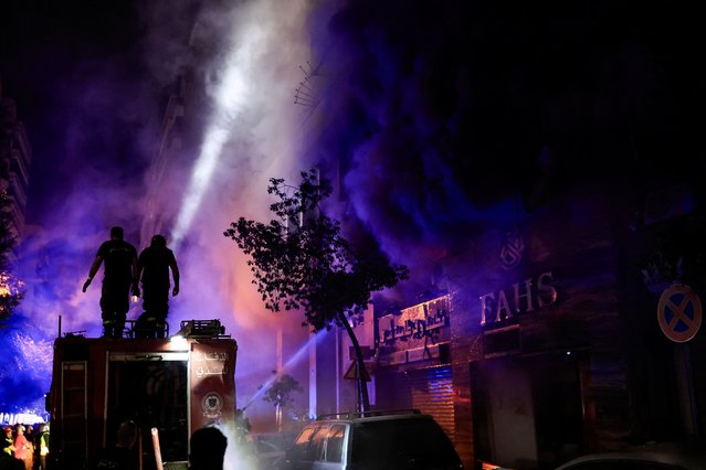 Emergency personnel works at the site of an Israeli strike in Beirut's Mar Elias street, Lebanon on November 17, 2024. (Photo by Thaier Al-Sudani/Reuters)