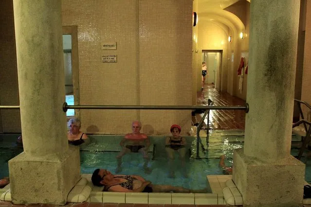 Bathers relax at the Lukacs Bath in Budapest, Hungary June 28, 2016. (Photo by Bernadett Szabo/Reuters)