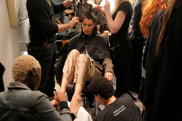 Model Bella Hadid is prepared backstage before walking in the Brandon Maxwell Spring/Summer 2018 collection presentation at New York Fashion Week in Manhattan, New York, U.S., September 8, 2017. (Photo by Andrew Kelly/Reuters)
