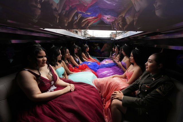 Quinceañeras ride in limousine as part of their celebration, in Bogota, Colombia, Friday, May 2, 2025. The Sueños Hechos Foundation, led by a former police officer, is hosting a quinceañera celebration on Friday for 24 disadvantaged teen girls. (Photo by Fernando Vergara/AP Photo)