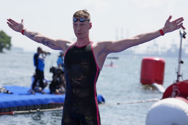 Germany's Florian Wellbrock reacts after winning the men's 10km open water swim at the world swimming championships in Singapore, Wednesday, July 16, 2025. (Photo by Vincent Thian/AP Photo)