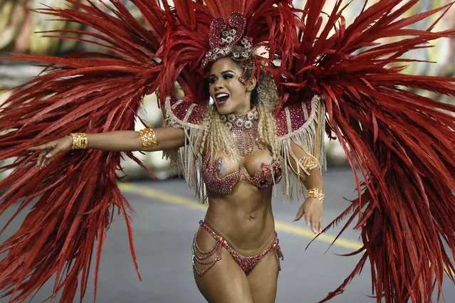A member of the samba school Grupo Especial X-9 Paulistana participate in the carnival celebration at the Anhembi sambodrome in Sao Paulo, Brazil, 10 February 2018. (Photo by Sebastiao Moreira/EPA/EFE)