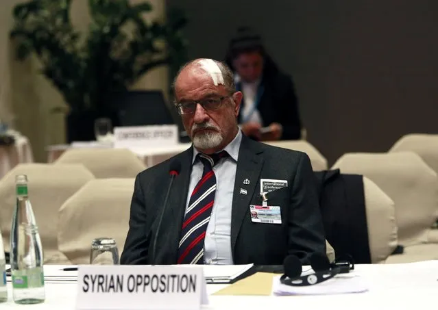 Senior Syrian opposition member Haitham al-Maleh sits alone during the second session of the Geneva-2 peace conference in Montreux, in this January 22, 2014 file photo. (Photo by Jamal Saidi/Reuters)