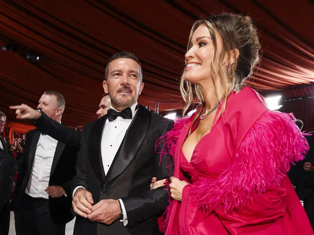 Spanish actor Antonio Banderas an Nicole Banderas pose on the champagne-colored red carpet during the Oscars arrivals at the 95th Academy Awards in Hollywood, Los Angeles, California, U.S., March 12, 2023. (Photo by Mario Anzuoni/Reuters)