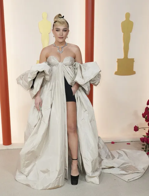 English actress Florence Pugh arrives at the Oscars on Sunday, March 12, 2023, at the Dolby Theatre in Los Angeles. (Photo by Jordan Strauss/Invision/AP Photo)