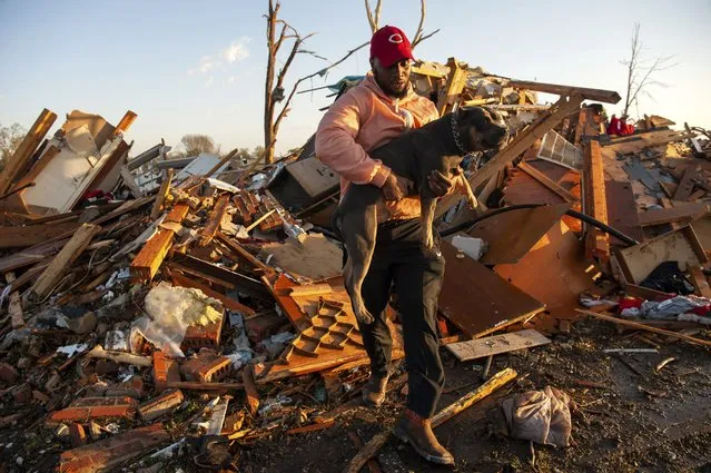 Extensive storm damage in Rolling Fork, Miss., where witnesses said the main commercial strip had been devastated and the National Weather Service confirmed that a tornado had touched down, on March 25, 2023. Rescuers were pulling people from rubble across the South on Saturday morning after a powerful storm system killed at least 23 in Mississippi and one more in Alabama. (Photo by Rory Doyle/The New York Times)