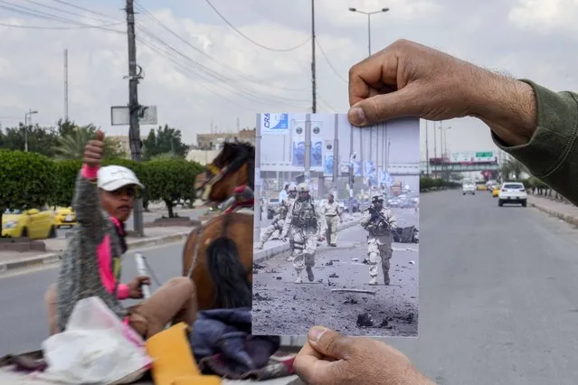 A photograph of U.S. soldiers securing the area where a car bomb exploded in the Maysalun square in Baghdad, Saturday, April 30, 2005, is inserted into the scene at the same location Tuesday, March 21, 2023, 20 years after the U.S. led invasion on Iraq and subsequent war. (Photo by Hadi Mizban/AP Photo)