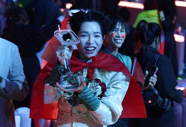 Duc Phuc, who represents Vietnam, holds the trophy after winning the Intervision International Music Contest 2025 in Moscow, Russia, on September 20, 2025. (Photo by Evgenia Novozhenina/Reuters)