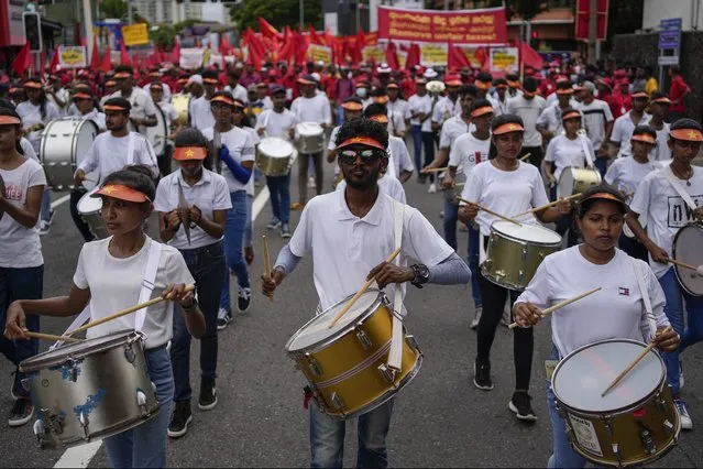 Members of the People's Liberation Front, a marxist political party, beat drums as they participate in a rally to mark May Day in Colombo, Sri Lanka, Monday, May 1, 2023. (Photo by Eranga Jayawardena/AP Photo)