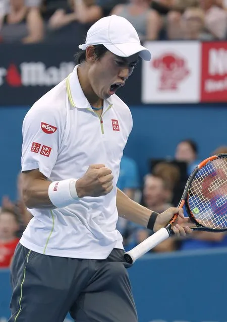 Kei Nishikori of Japan wins a point against Milos Raonic of Canada during their men's singles semi final match at the Brisbane International tennis tournament in Brisbane, January 10, 2015. (Photo by Jason Reed/Reuters)