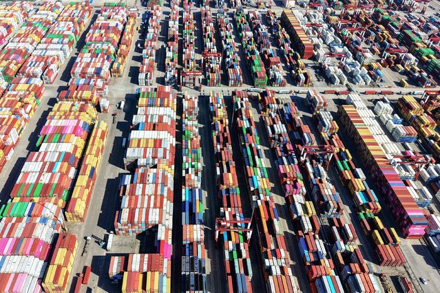 This photo shows an aerial view of the port in Qingdao in China's eastern Shandong province on November 3, 2025. (Photo by AFP Photo/China Stringer Network)