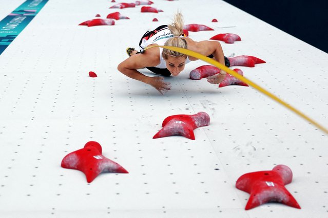 An overview shows Poland's Aleksandra Miroslaw competing to win the women's sport climbing speed final during the Paris 2024 Olympic Games at Le Bourget Sport Climbing Venue in Le Bourget on August 7, 2024. (Photo by Michael Reaves/Reuters)