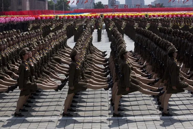 Female North Korean soldiers march during a mass military parade on Kim Il Sung Square in Pyongyang to mark the 60th anniversary of the Korean War armistice Saturday, July 27, 2013. (Photo by David Guttenfelder/AP Photo)