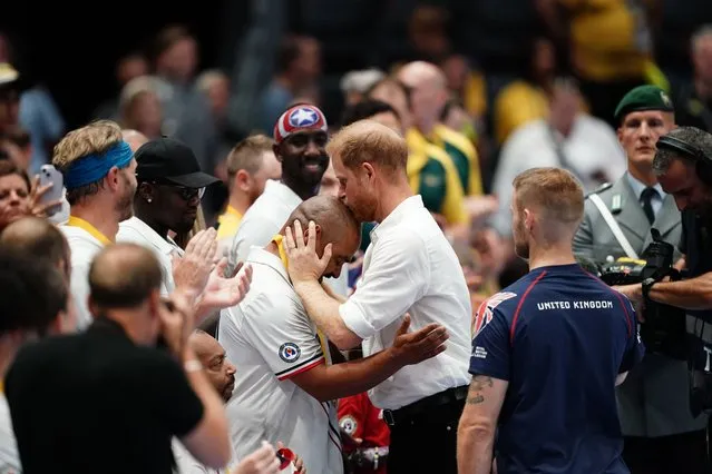 The Duke of Sussex, presents medals during the wheelchair rugby finals at the Merkur Spiel-Arena during the Invictus Games in Dusseldorf, Germany on Monday, September 11, 2023. (Photo by Jordan Pettitt/PA Wire)