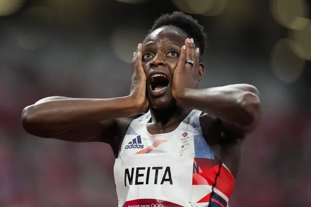 Daryll Neita, of Britain, reacts after a women's 100-meter semifinal at the 2020 Summer Olympics, Saturday, July 31, 2021, in Tokyo. (Photo by Petr David Josek/AP Photo)