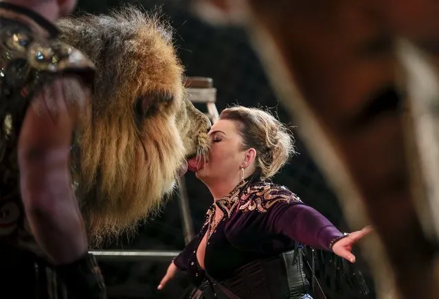 A lion and its trainer perform during “Stars and starlets”, a new programme, at the National Circus in the Ukrainian capital of Kiev April 30, 2015. (Photo by Gleb Garanich/Reuters)