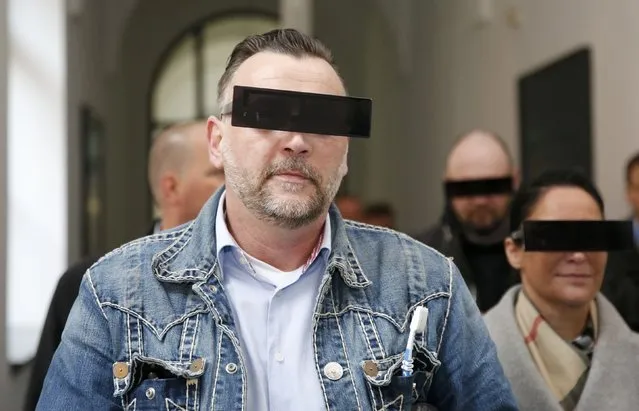 Lutz Bachmann (L), co-founder of Patriotic Europeans Against the Islamisation of the West (PEGIDA), arrives with his wife Vicky at a courtroom for his trial to be charged with incitement over Facebook posts in a court in Dresden, Germany, April 19, 2016. (Photo by Fabrizio Bensch/Reuters)