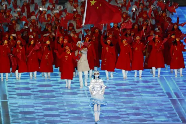 Athletes of China march during the Opening Ceremony for the Beijing 2022 Olympic Games at the National Stadium, also known as Bird's Nest, in Beijing China, 04 February 2022. (Photo by Alex Plavevski/EPA/EFE)