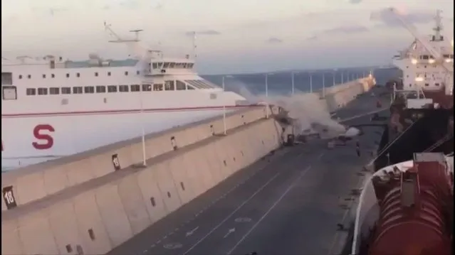 This image taken from video shows a Naviera Armas ferry hitting the breakwater at Puerta de la Luz, Gran Canaria, Spain on Friday, April 21, 2017. Thirteen ferry passengers were injured when the boat slammed into a breakwater in a port on the Canary Islands, Spanish authorities said Saturday. Manolo Vidal, spokesman for Naviera Armas, the company that owns the ferry, says that a “loss of electrical power” caused the accident as the boat was leaving the Puerta de la Luz on the island of Gran Canaria Friday night. (Photo by EMERGCAN via AP Photo)
