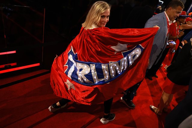 Mary Timion displays a former U.S. President Donald Trump cape on the fourth day of the Republican National Convention at the Fiserv Forum on July 18, 2024 in Milwaukee, Wisconsin. Delegates, politicians, and the Republican faithful are in Milwaukee for the annual convention, concluding with former President Donald Trump accepting his party's presidential nomination. The RNC takes place from July 15-18. (Photo by Joe Raedle/Getty Images)